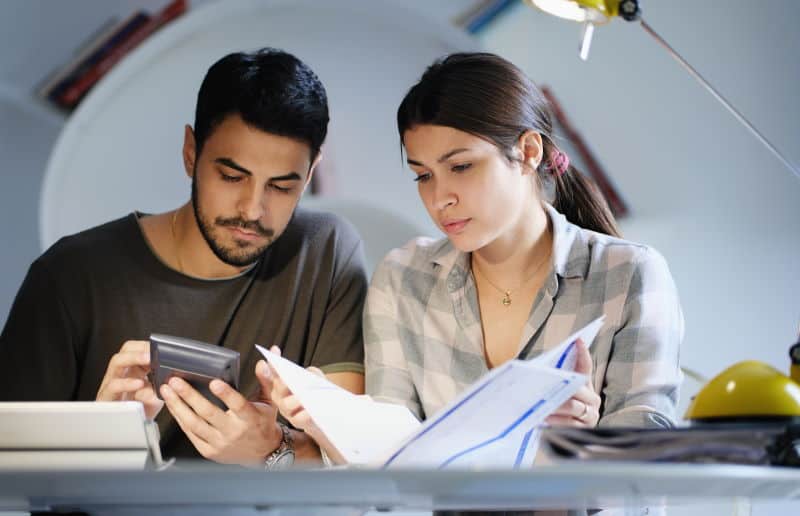 Man Woman Worried Taxes Family Budget