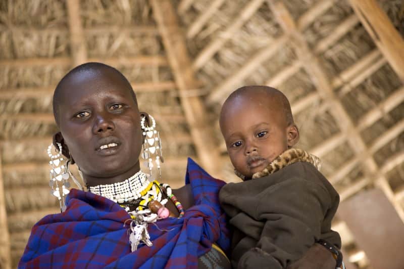 Portrait Of A Masai Mother And His Son